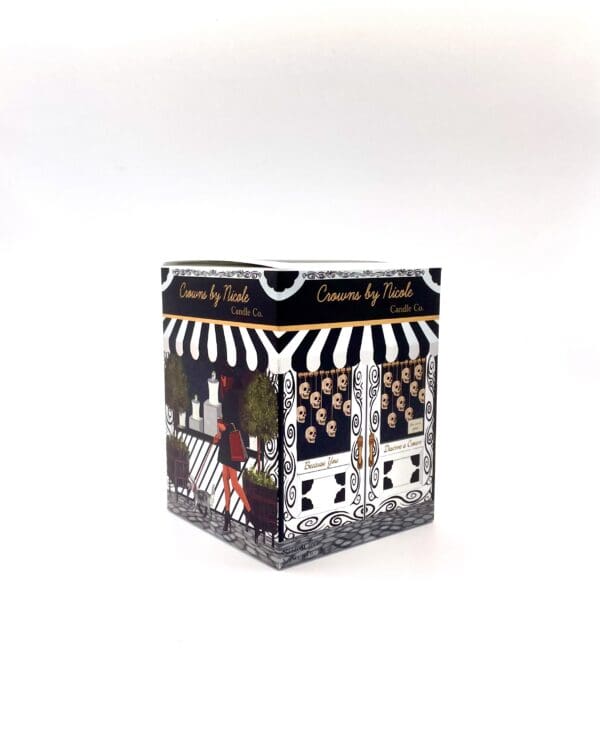 A decorative square box with black and white stripes and illustrations of a quaint café scene, labeled "Sass in Scarlett" by nicole.